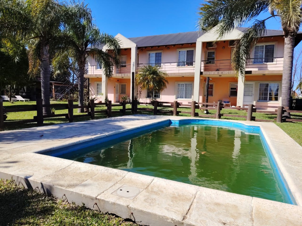 2 ambientes con parque y piscina